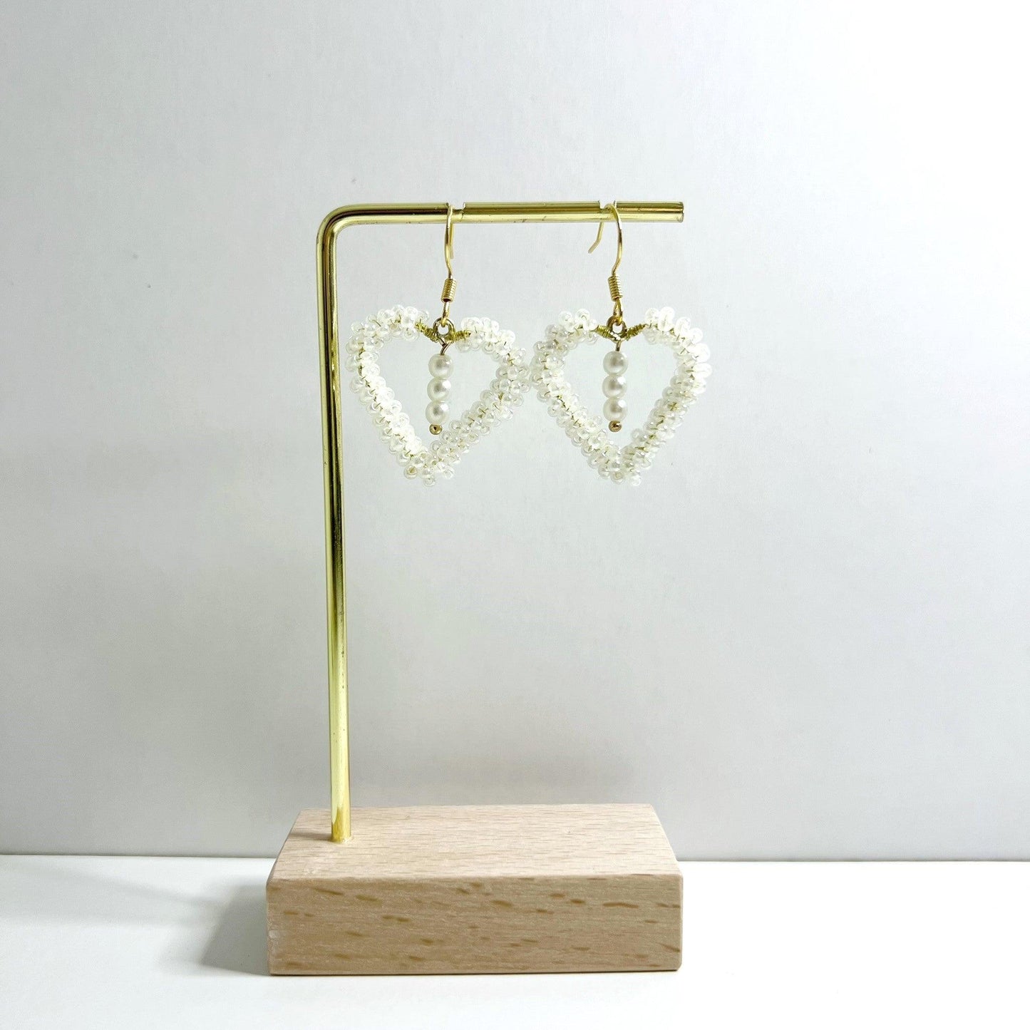Cupid Love Earrings White Demo.